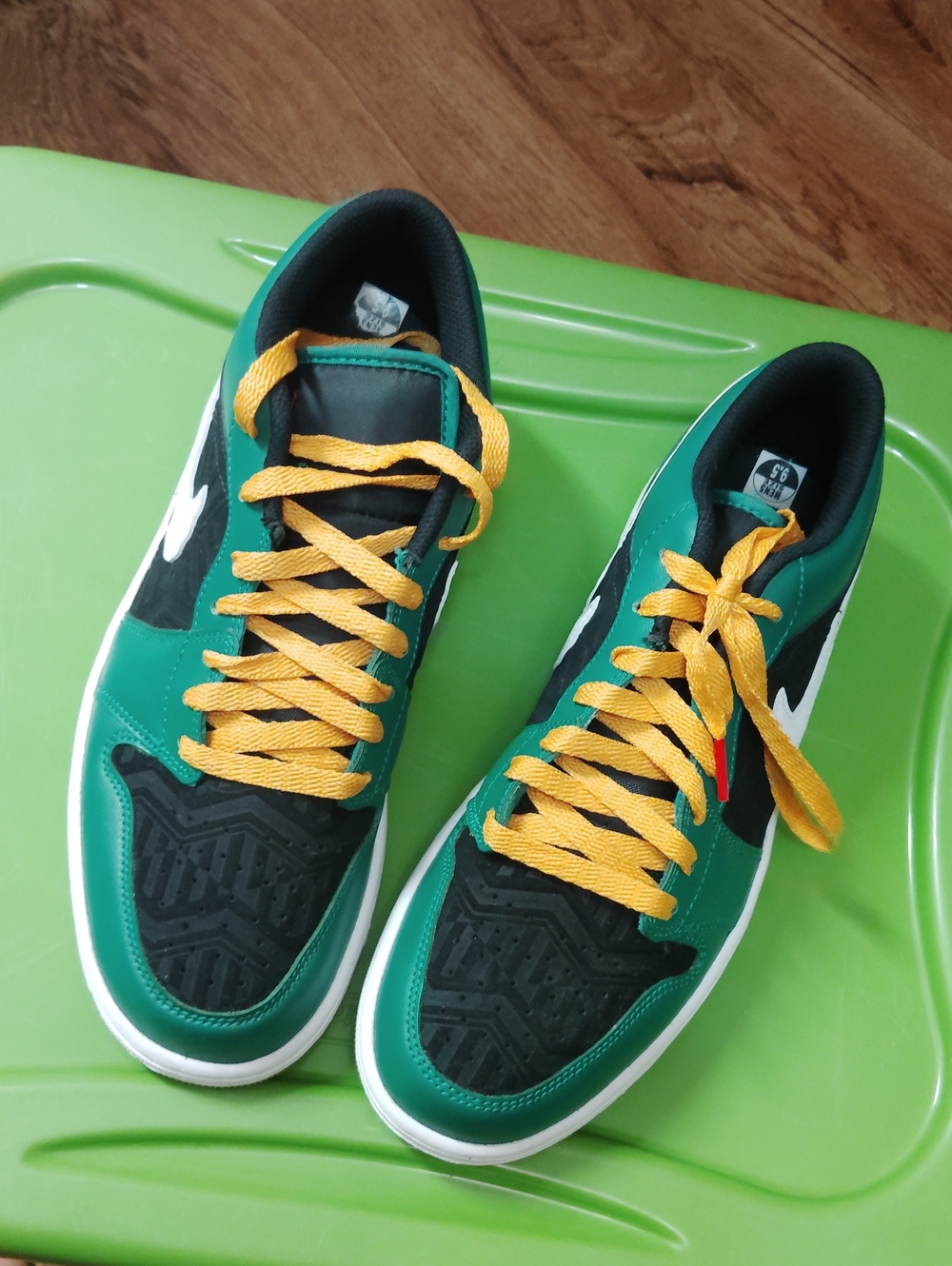 Nike Green and Black Sneakers with Yellow Laces